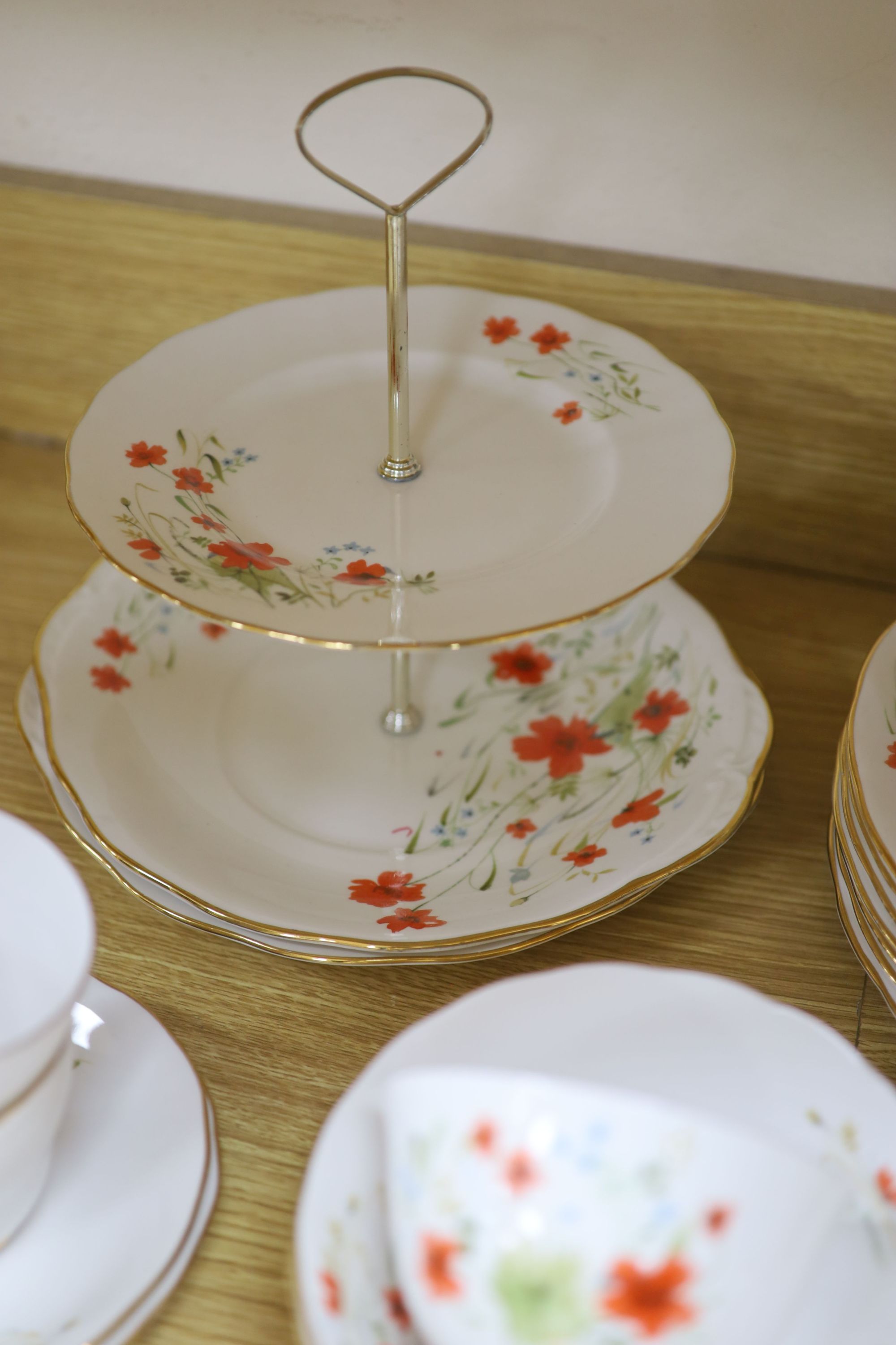 A Colclough floral decorated fifty nine piece part tea service